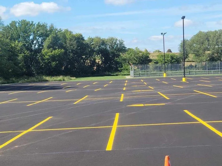 297482590_384160333849432_583363152506706752_n-1920w New asphalt parking lot with all the line work done