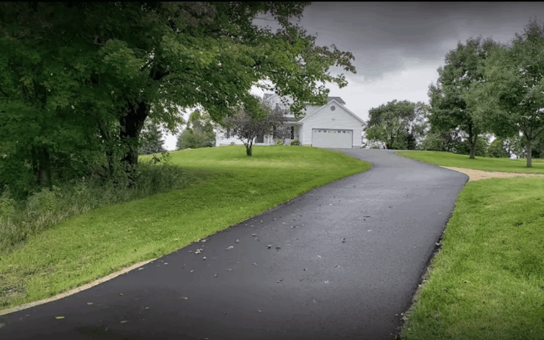 Asphalt vs. Concrete: Which Is the Best Driveway Pavement? (Cost, Lifespan, & Maintenance)